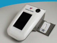 Lateral Flow reader with open drawer and Lateral Flow cassette